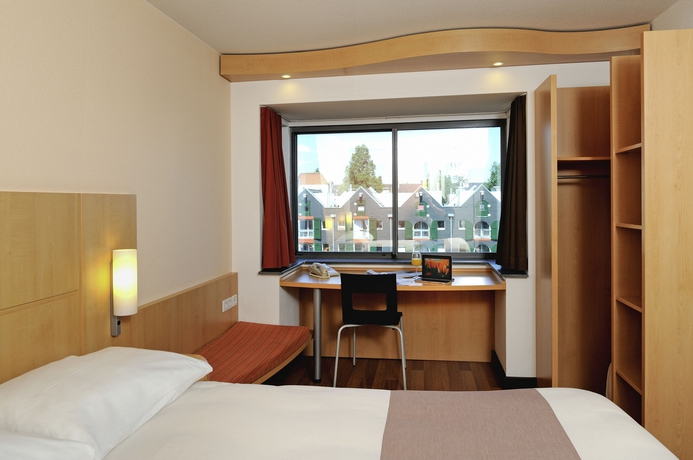Imagen de la habitación del Hotel Ibis Amsterdam Centre Stopera. Foto 8