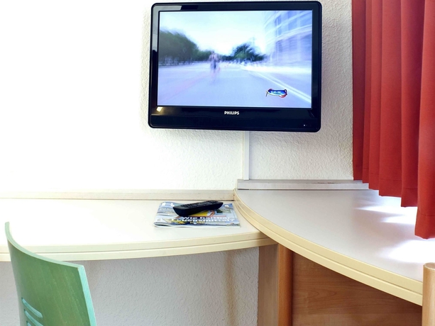 Imagen de la habitación del Hotel Ibis Berlin Mitte. Foto 15