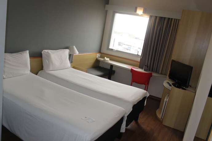 Imagen de la habitación del Hotel Ibis Betim. Foto 6