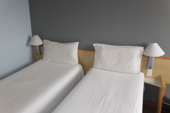 Imagen de la habitación del Hotel Ibis Betim. Foto 11