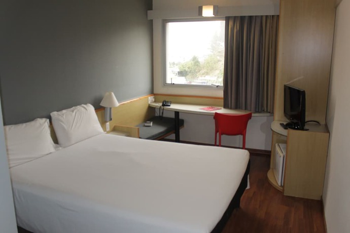 Imagen de la habitación del Hotel Ibis Betim. Foto 14