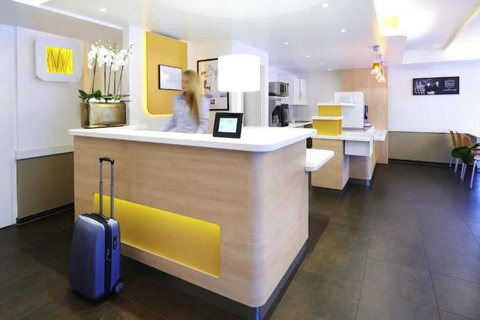 Imagen de los interiores del Hotel Ibis Budget Basel Pratteln. Foto 14