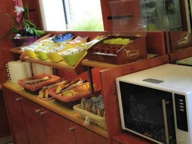 Imagen del bar/restaurante del Hotel Ibis Budget Cannes Centre Ville. Foto 8