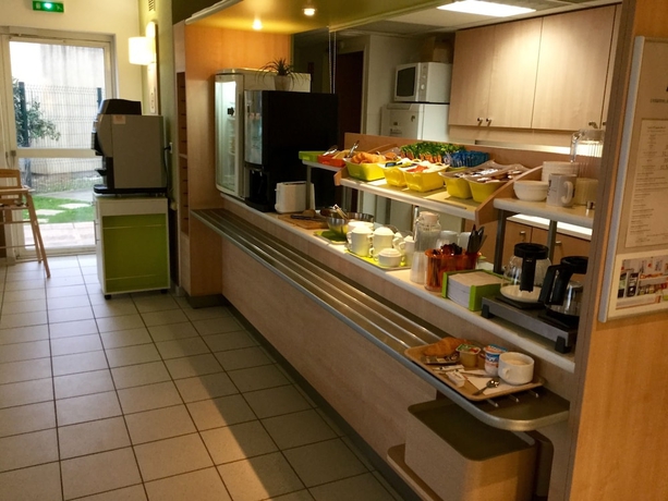 Imagen del bar/restaurante del Hotel Ibis Budget Carcassonne Aéroport. Foto 7