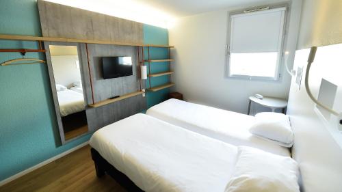 Imagen de la habitación del Hotel Ibis Budget Dijon Centre Clemenceau. Foto 11