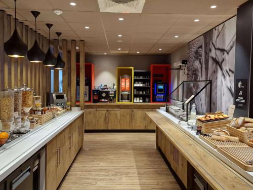 Imagen del bar/restaurante del Hotel Ibis Budget Dijon Centre Clemenceau. Foto 4