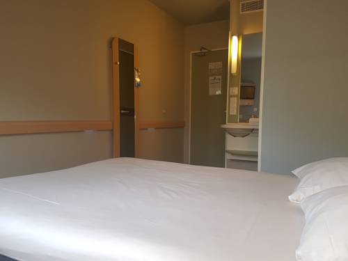 Imagen de la habitación del Hotel Ibis Budget Dole. Foto 16