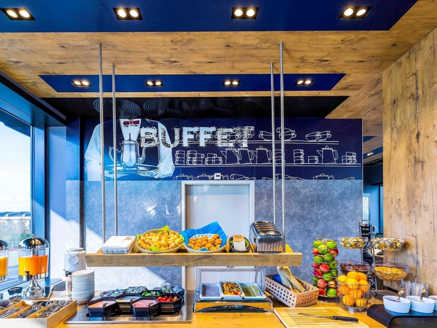 Imagen del bar/restaurante del Hotel Ibis Budget Genève Palexpo Aéroport. Foto 5