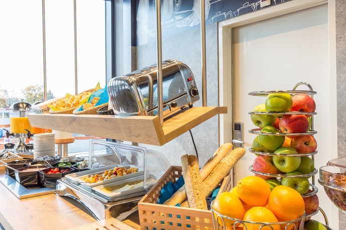 Imagen del bar/restaurante del Hotel Ibis Budget Genève Palexpo Aéroport. Foto 6