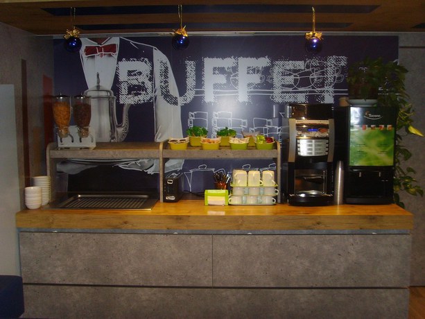 Imagen de los interiores del Hotel Ibis Budget L'isle Adam. Foto 19