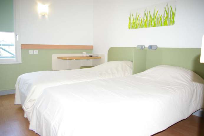 Imagen de la habitación del Hotel Ibis Budget Lyon Caluire Cite Internationale. Foto 7