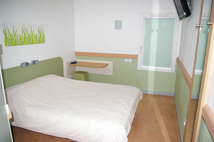 Imagen de la habitación del Hotel Ibis Budget Lyon Caluire Cite Internationale. Foto 17