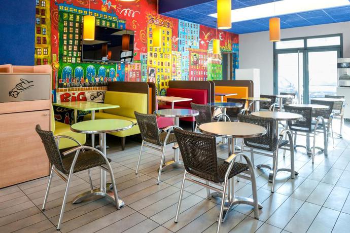 Imagen del bar/restaurante del Hotel Ibis Budget Lyon Centre - Gare Part-dieu. Foto 2