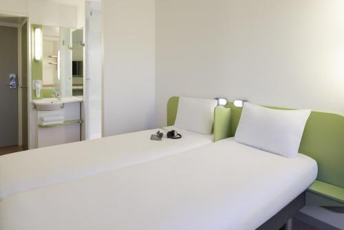 Imagen de la habitación del Hotel Ibis Budget Lyon Confluence. Foto 6