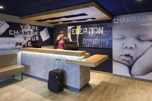 Imagen de los interiores del Hotel Ibis Budget Lyon Confluence. Foto 7