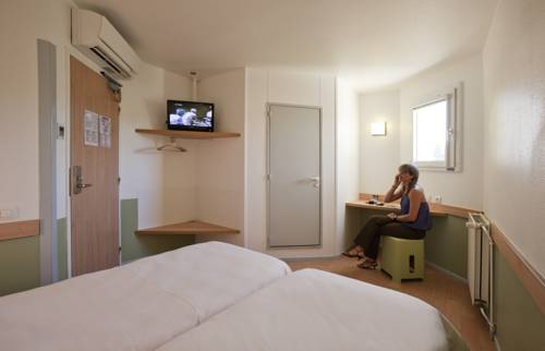 Imagen de la habitación del Hotel Ibis Budget Lyon Est Saint Quentin Fallavier. Foto 4