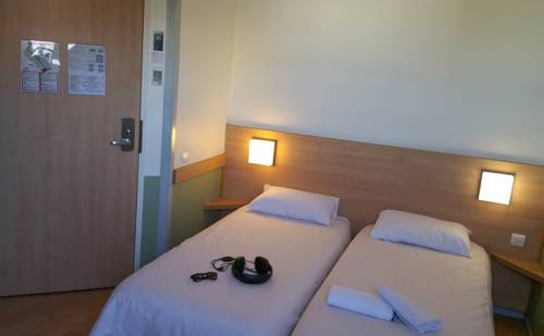 Imagen de la habitación del Hotel Ibis Budget Lyon Est Saint Quentin Fallavier. Foto 9