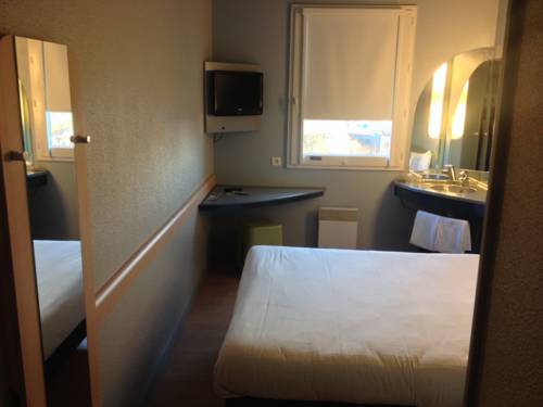Imagen de la habitación del Hotel Ibis Budget Lyon Villeurbanne. Foto 9