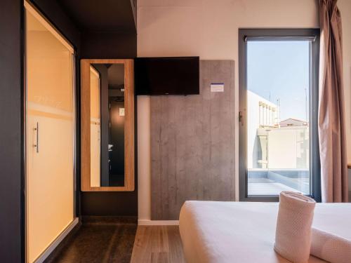 Imagen de la habitación del Hotel Ibis Budget Madrid Centro Lavapies. Foto 16