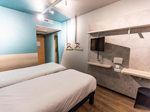 Imagen de la habitación del Hotel Ibis Budget Millau Viaduc. Foto 6