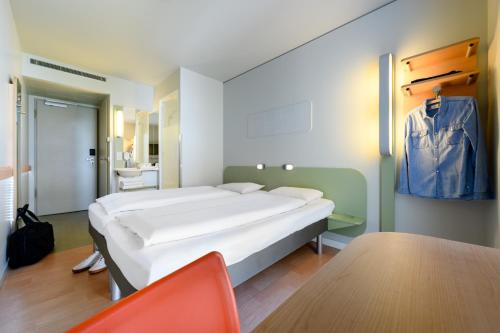 Imagen de la habitación del Hotel Ibis Budget Muenchen City Olympiapark. Foto 7