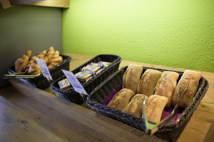 Imagen del bar/restaurante del Hotel Ibis Budget Nanterre La Defense. Foto 7