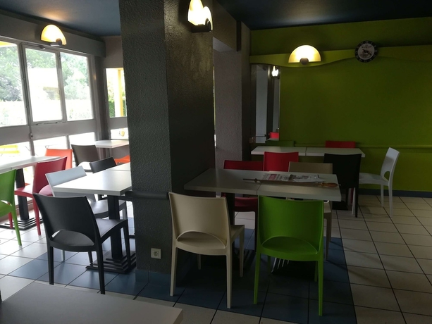 Imagen del bar/restaurante del Hotel Ibis Budget Nimes Caissargues. Foto 9