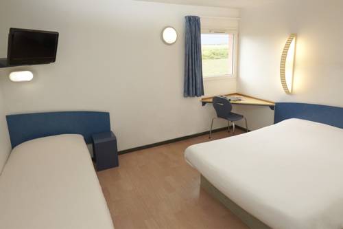 Imagen de la habitación del Hotel Ibis Budget Nuits Saint Georges. Foto 4