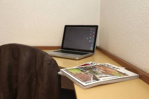 Imagen de la habitación del Hotel Ibis Budget Nuits Saint Georges. Foto 6