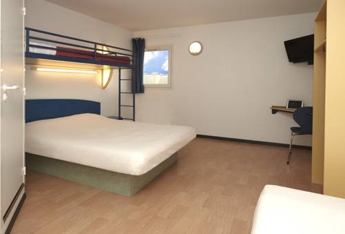 Imagen de la habitación del Hotel Ibis Budget Nuits Saint Georges. Foto 16