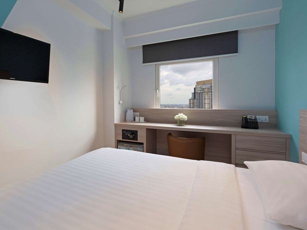 Imagen de la habitación del Hotel Ibis Budget Phnom Penh Riverside. Foto 6