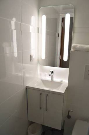 Imagen de la habitación del Hotel Ibis Budget Rouen Nord Isneauville. Foto 4