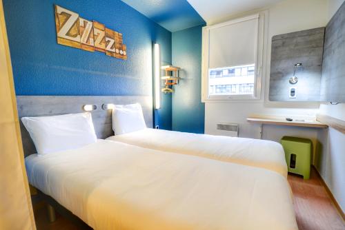 Imagen de la habitación del Hotel Ibis Budget Rueil Malmaison. Foto 7