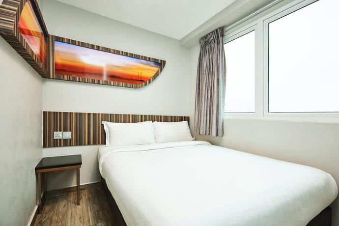 Imagen de la habitación del Hotel Ibis Budget Singapore Selegie. Foto 3