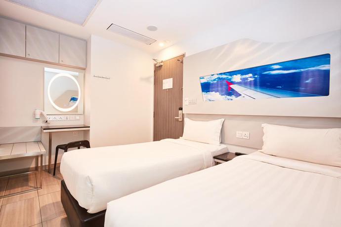 Imagen de la habitación del Hotel Ibis Budget Singapore Selegie. Foto 4