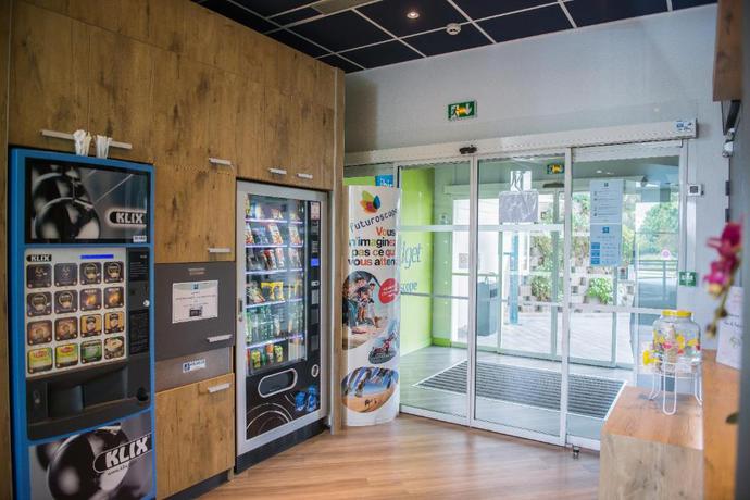 Imagen de los interiores del Hotel Ibis Budget Site du Futuroscope. Foto 8