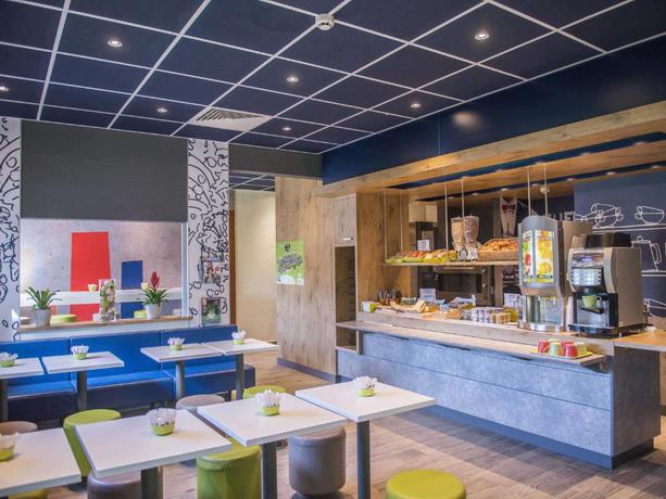 Imagen del bar/restaurante del Hotel Ibis Budget Site du Futuroscope. Foto 2