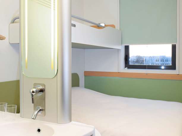 Imagen de la habitación del Hotel Ibis Budget Toulouse Aéroport. Foto 2