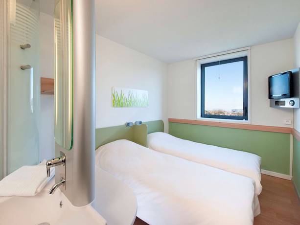 Imagen de la habitación del Hotel Ibis Budget Toulouse Aéroport. Foto 9