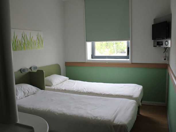 Imagen de la habitación del Hotel Ibis Budget Toulouse Aéroport. Foto 10