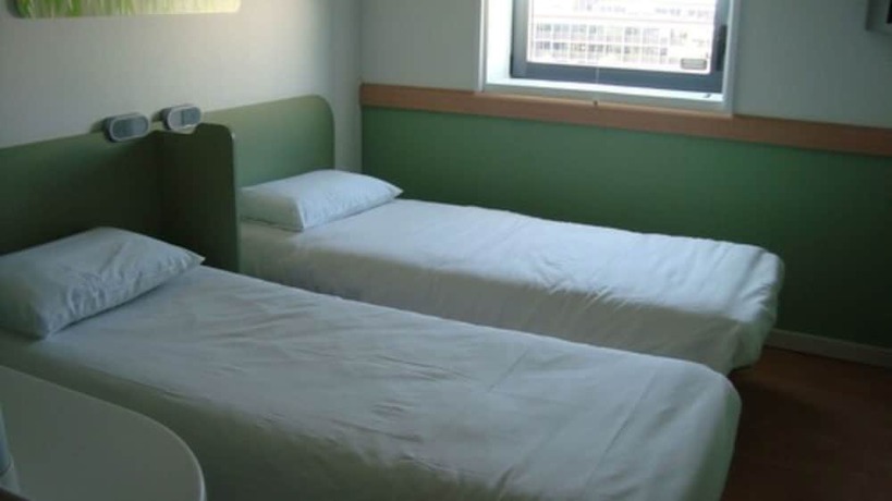 Imagen de la habitación del Hotel Ibis Budget Toulouse Aéroport. Foto 11