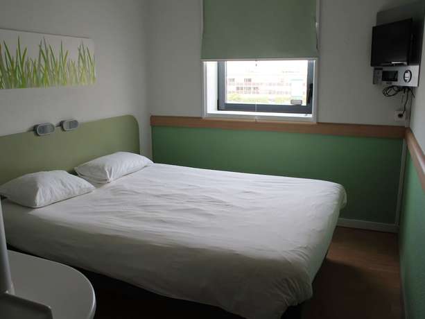 Imagen de la habitación del Hotel Ibis Budget Toulouse Aéroport. Foto 14
