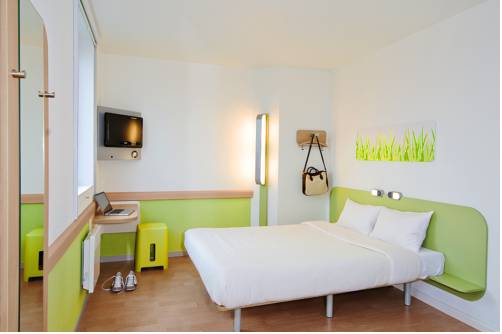 Imagen de la habitación del Hotel Ibis Budget Valenciennes Petite Forêt. Foto 11