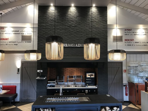 Imagen del bar/restaurante del Hotel Ibis Caen Porte De Bretagne. Foto 3