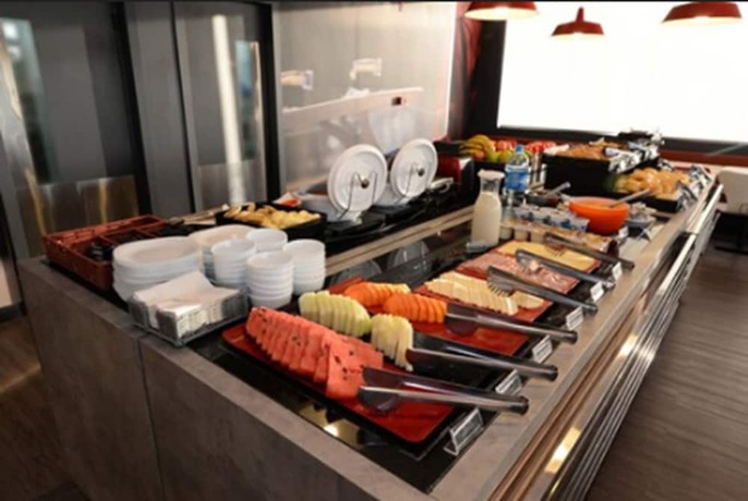 Imagen del bar/restaurante del Hotel Ibis Campo Grande. Foto 10