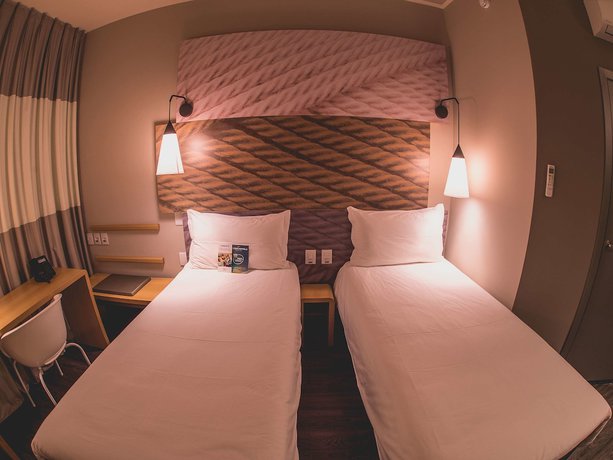 Imagen de la habitación del Hotel Ibis Carlos Barbosa. Foto 19