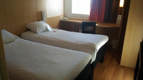 Imagen de la habitación del Hotel Ibis Chalon Sur Saone Nord. Foto 9