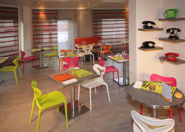 Imagen del bar/restaurante del Hotel Ibis Clermont Ferrand Sud Carrefour Herbet. Foto 6