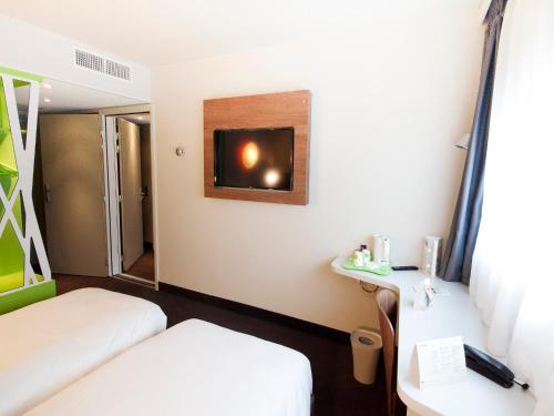 Imagen de la habitación del Hotel Ibis Clermont-Ferrand Centre Stade. Foto 16