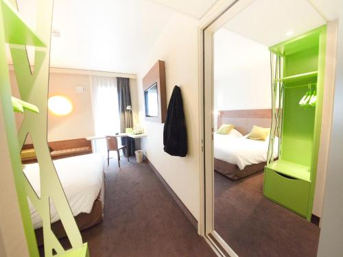 Imagen de la habitación del Hotel Ibis Clermont-Ferrand Centre Stade. Foto 17